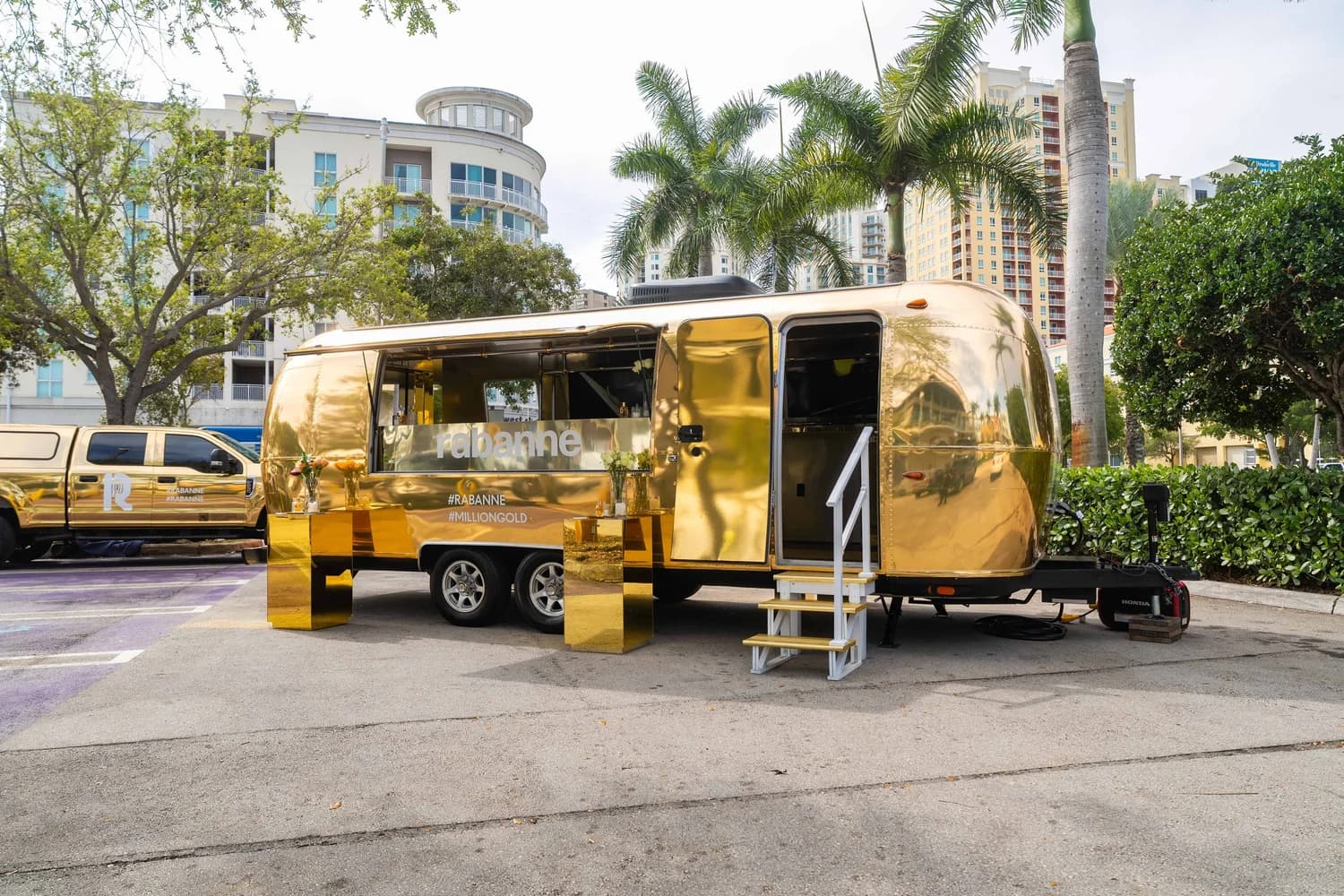 Gold Rabanne brand activation trailer built by Purple Heart Fabrication Shop